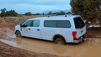 2WD Ford Truck Goes Mudding And Makes A Call!